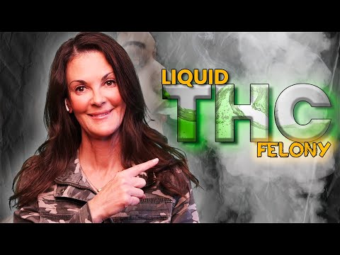 Woman in camouflage jacket pointing to text "LIQUID THC FELONY" with a smoky gray background.