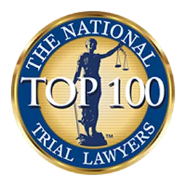 Gold and blue circular emblem with Lady Justice and text "The National Trial Lawyers Top 100.