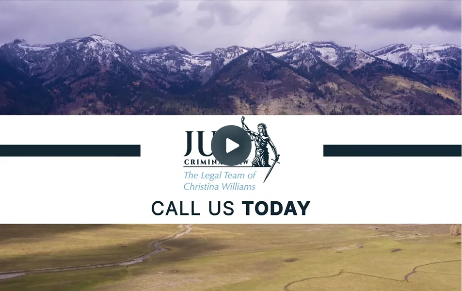 Snow-capped mountains above a valley with legal team logo and "Call Us Today" text.