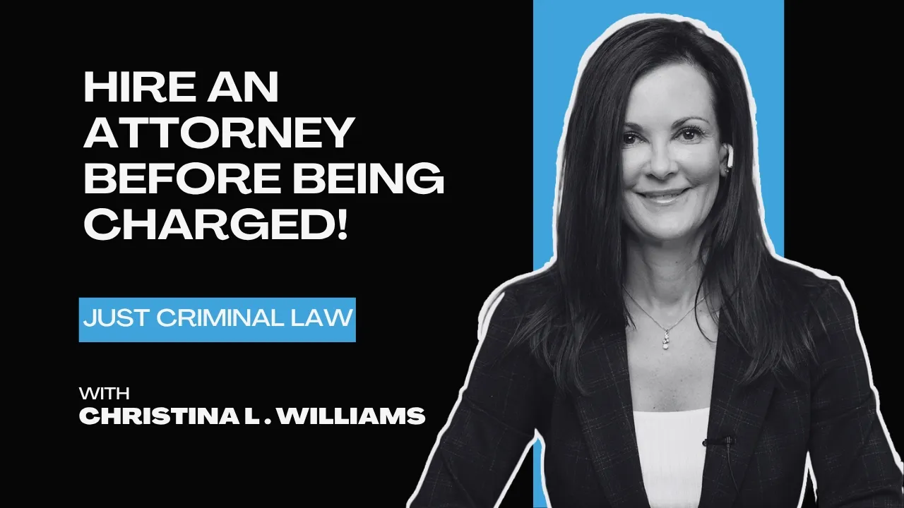 Professional woman in black blazer with text urging to hire an attorney before being charged.